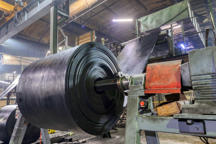 Rubber conveyor belts being manufactured