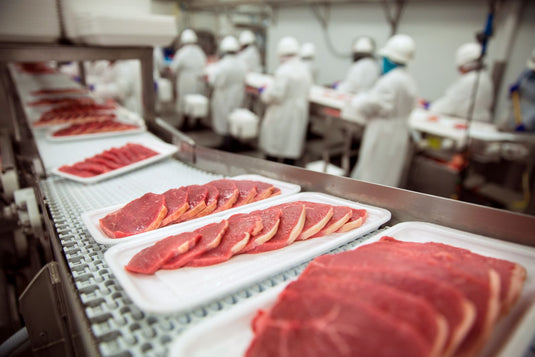 Sliced pork chops at a meat processing plant